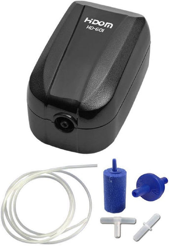 a single outlet aquarium air pump with a glossy black finish with a blue air stone, some transparent tubing plus valve and connectors