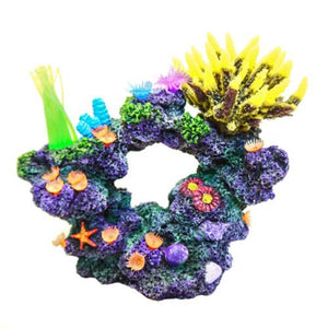 a realistic looking coral rock aquarium ornament covered with polyps